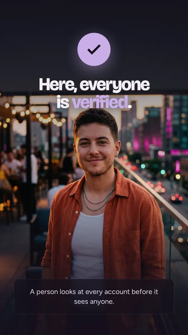 Here, everyone is verified. A person looks at every account before it sees anyone. Portrait of a smiling person on a street lit by neon signs.